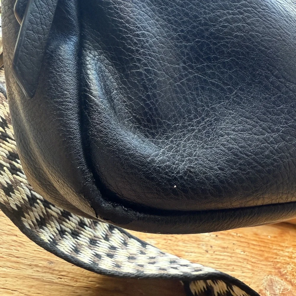 Anthropologie — Black faux Leather sling Bag with fabric Checkered Strap